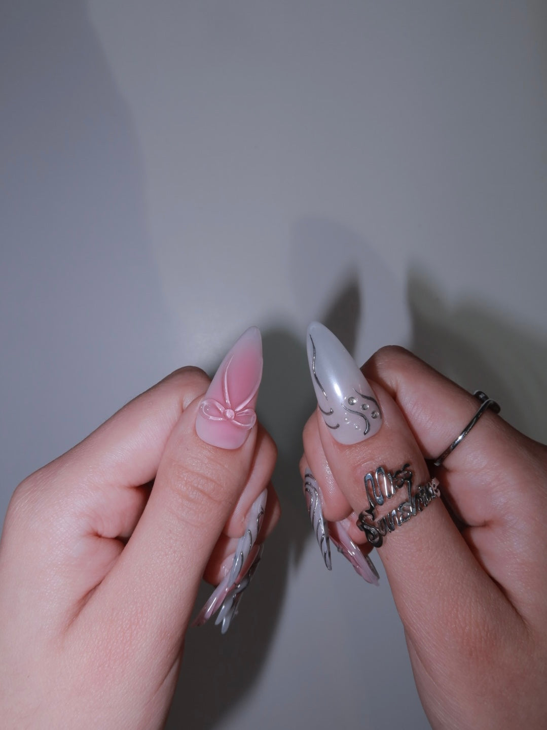 Long nails with silver accents
