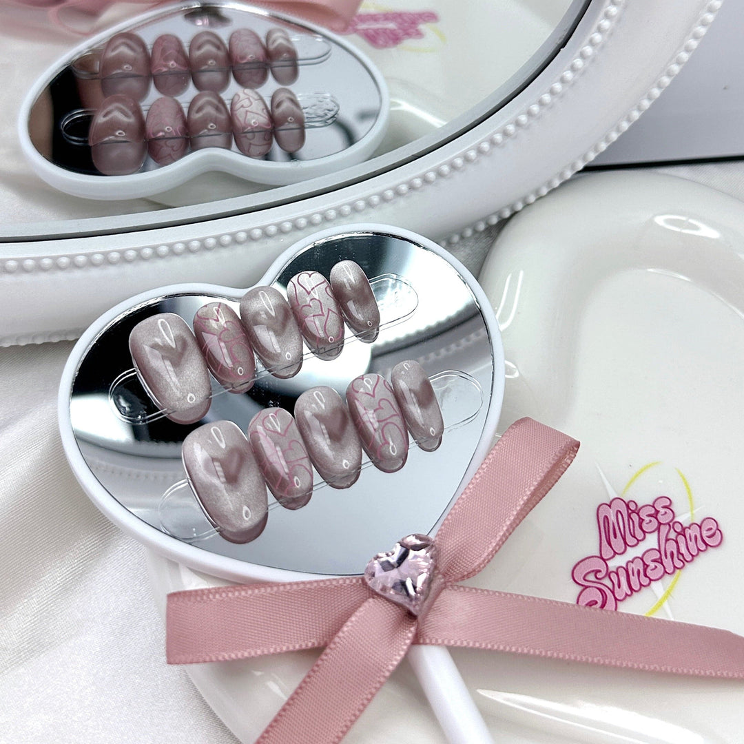 Pink short oval Valentine nails