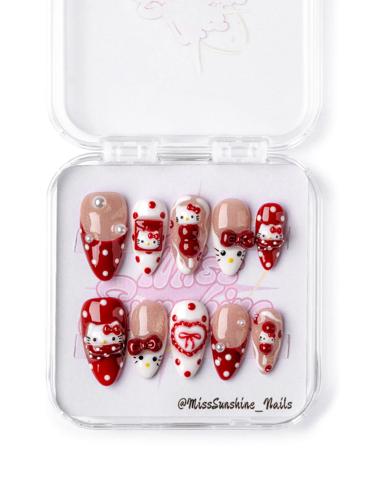 Festive Lunar New Year short almond press-on nails with tanghulu candy accents and red bows