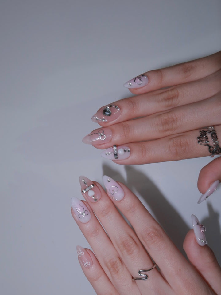 Trendy pink press-on nails for Gen Z girls