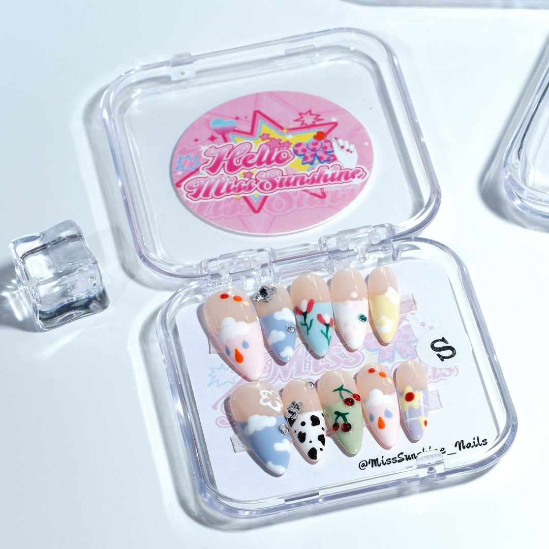Cow print floral ladybug nails