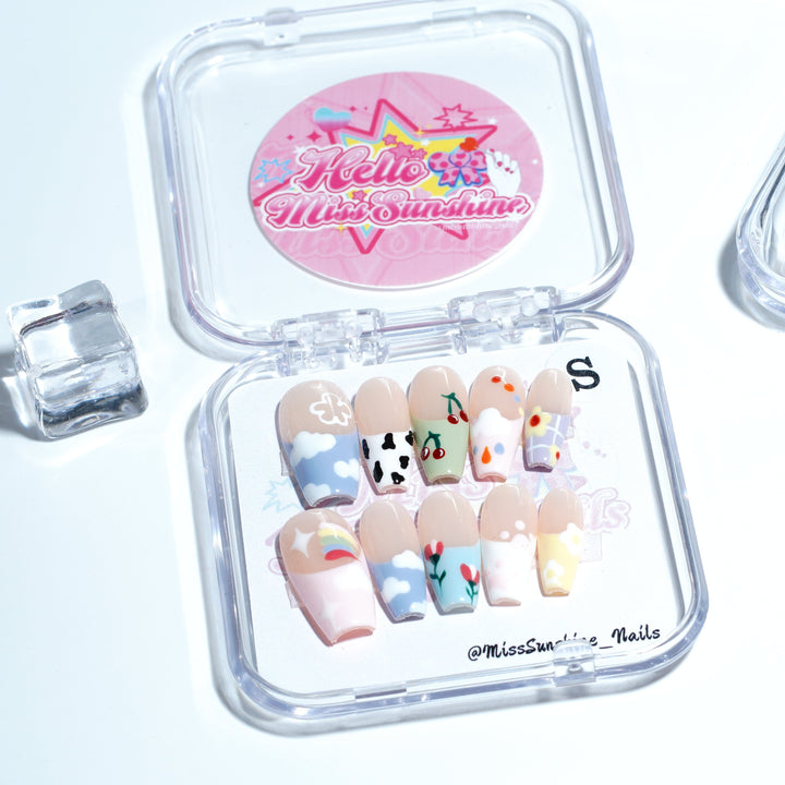 Glossy nails with seashell charm